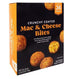 Generic Mac and Cheese Bites , Cavatappi pasta and a creamy, three-cheese filling coated in panko bread crumbs. Crispy