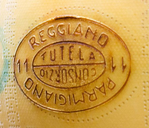 1 Parmigiano Reggiano - Grated Cheese - Pound Ground Fresh Daily.