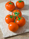 CLUSTER TOMATOES At The Neighborhood Corner Store Organic Greenhouse Red On-The-Vine Tomatoes, Fresh Produce, 1 pound