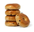 Generic 6 38.4 oz 2.4 Cinnamon Raisin Bagels are baked to a golden brown, with a crispy exterior and soft interior.