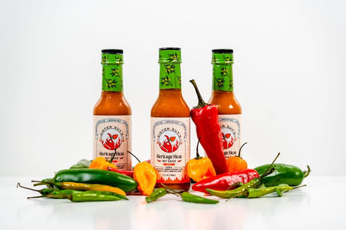Sister Suy's 5 oz Sister Suys Heritage Heat Hot Sauce Water, Pineapple, Vinegar, Palm Sugar, Olives, Garlic, Fish