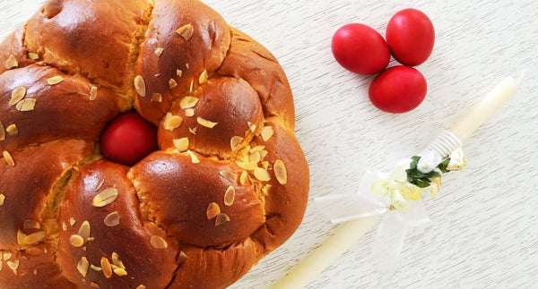 Generic Traditional Greek Easter Bread Tsoureki with Red Chocolate Egg, Braided Sweet Brioche