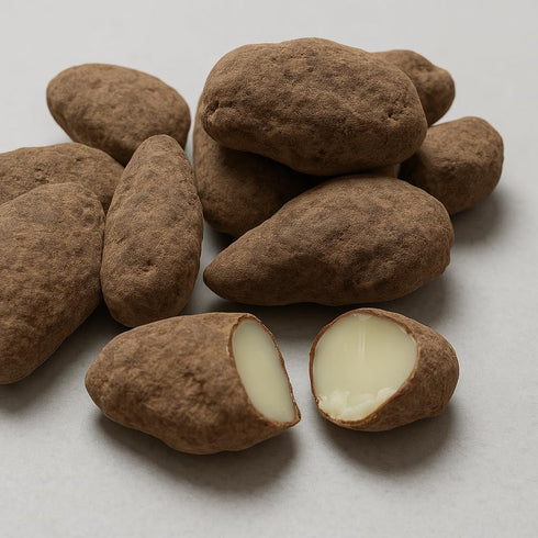 The Brittle Box Candy Co. Brazil nuts coated in chocolate and dusted in cocoa 1 pound hand