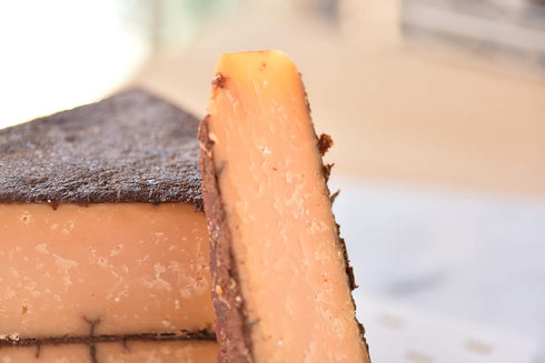 1lb 16 1 Tony Caputos Cheese Caves Cave Copper Caputo | Assiago-Style, Month Aged Made with Cows Milk and Cherries |