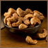3.5 oz 3.5 Squirrel Brand Caramel Toasted Colada Cashews with sweet toasted coconut, natural flavors + Squirrel Brand