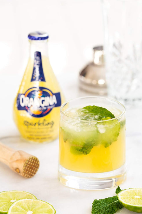 Orangina (Pack 24) (11.2 oz - Citrus Sparkling Juice Beverage - Light Pulp - Original Imported European French Recipe