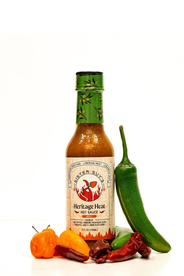 Sister Suy's Sister Suys Heritage Heat Hot Sauce Water, Pineapple, Vinegar, Palm Sugar, Olives,