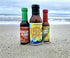 Sea Monster Sauces 1 1 1 Sampler - Bottle Surfer Slappin! Sauce - Bottle Danger Berry - Bottle Lift Up Hot Sauce