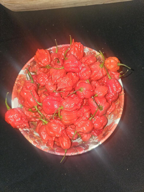 Generic Zozoma 2 B6, Packed Farms Pounds Fresh Red Carolina Reaper Peppers. Contains vitamins A, C, and potassium.