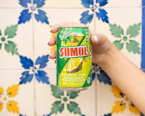 Sumol 11.15 oz (Pack 24) Pineapple Sparkling Juice Beverage, Real Fruit Pulp, Imported from Portugal, Cans