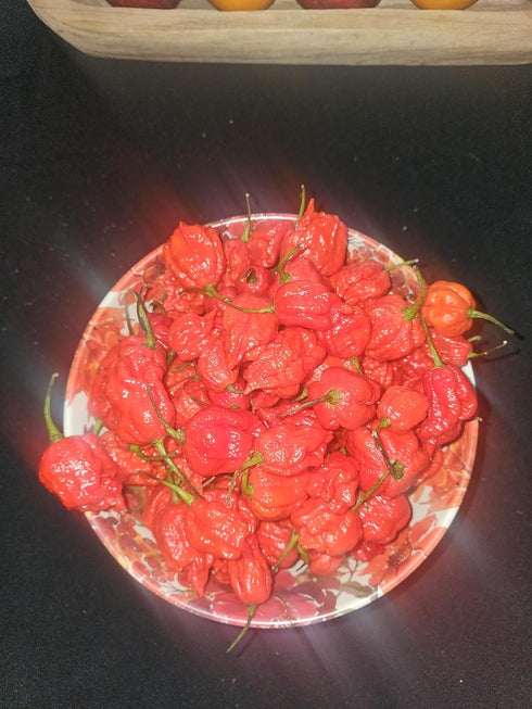 Generic Zozoma Farms 2 Pounds Fresh Red Carolina Reaper Peppers. Contains vitamins A,