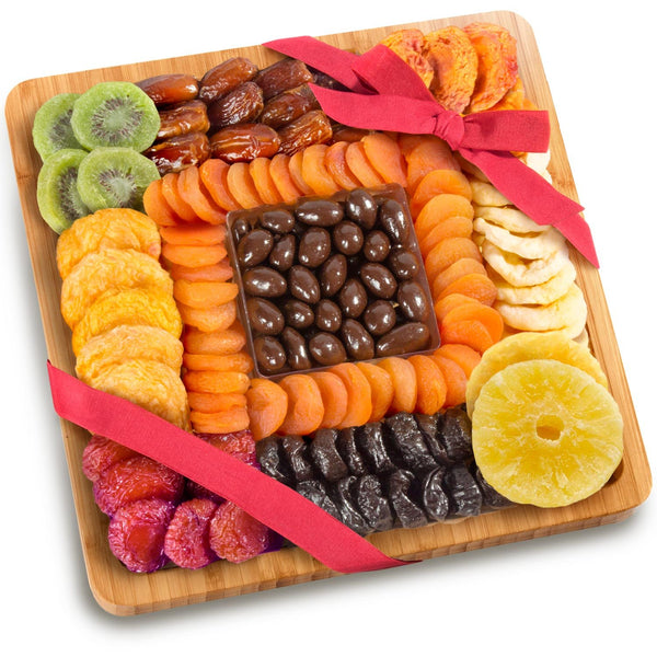 Golden State Fruit Dried Fruit and Chocolate Nuts On Bamboo Cutting Board