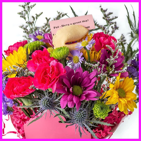 Pretty In Pink Fresh Cut Live Flowers Arranged in a Takeout Container with your Personal Message Tucked Inside a