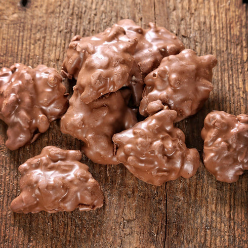 Mascot Pecan Shelling Company 1955 1.25 Mascot Nut Candy Since - Pecan Clusters Smooth Milk Chocolate, Caramel
