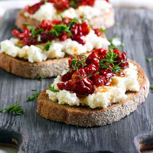 2 (8.5 oz Traina Home Grown California Sun Dried Tomatoes in Oil Halves, Marinated with Italian Herbs & Olive Oil
